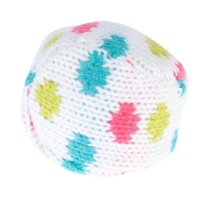 Knitted ball made of white fabric with colourful patterns in blue, green and red. Suitable as a toy.