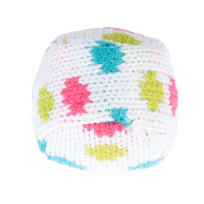 Knitted ball in white with colourful patterns in green, pink and blue.