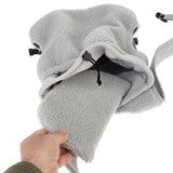 Grey fleece pouch with adjustable drawstring and padded interior, open and held by hand.