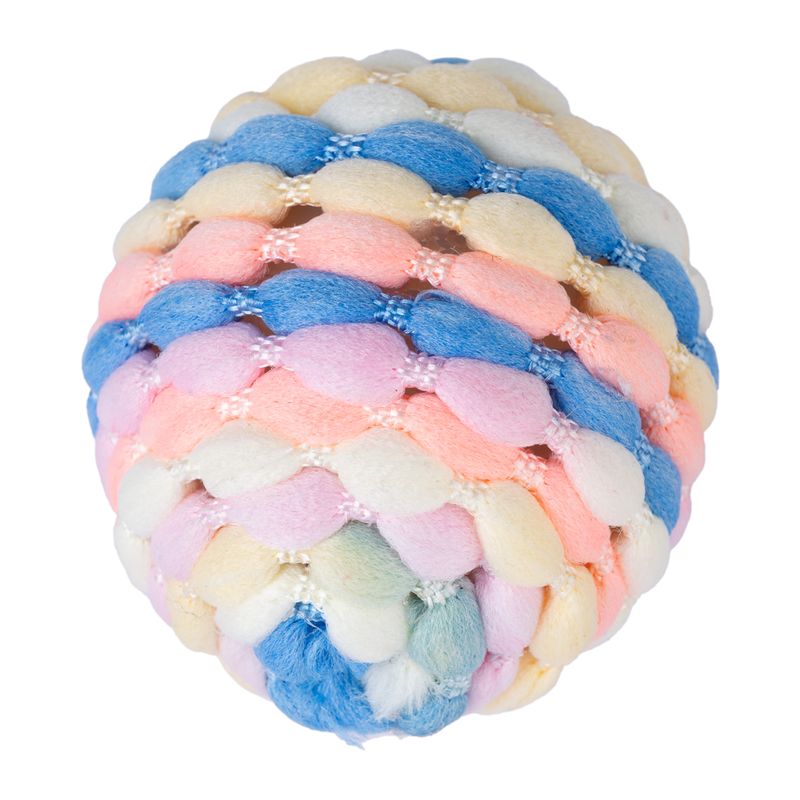 Braided ball made of colourful fabric in pastel shades: blue, pink, yellow and white.