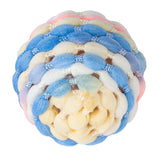 Colourful ball made of braided fabric in blue, white, yellow and pink. Round shape with soft texture.