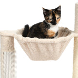 Cat sitting in a beige hammock platform attached to a scratching post, demonstrating use of the product as a resting area.