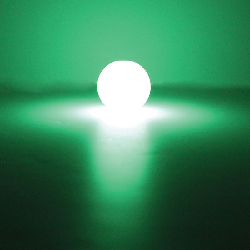 Luminous ball with green light, suitable for dark environments or night activities.
