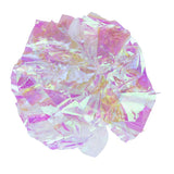 Iridescent toy made of transparent plastic with shimmering pink and yellow accents.