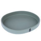 Round, grey plastic feeding bowl with Trixie logo on the side.