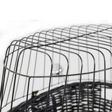 Close-up of a black metal cage with grid structure, suitable for safely housing pets or accessories.