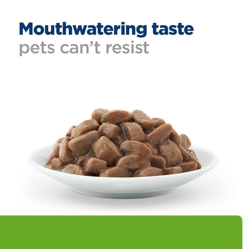 Tray with brown meat pieces in gravy. Text: Mouthwatering taste pets can't resist.