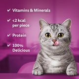Vitamins & minerals, less than 2 kcal per piece, protein, 100% delicious. Cat in the foreground.