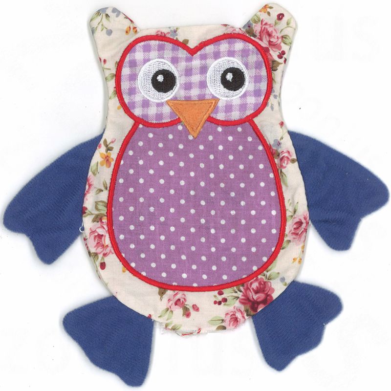 Toy in owl shape made of fabric with floral pattern, purple spotted belly and blue wings. Suitable for pets to play.