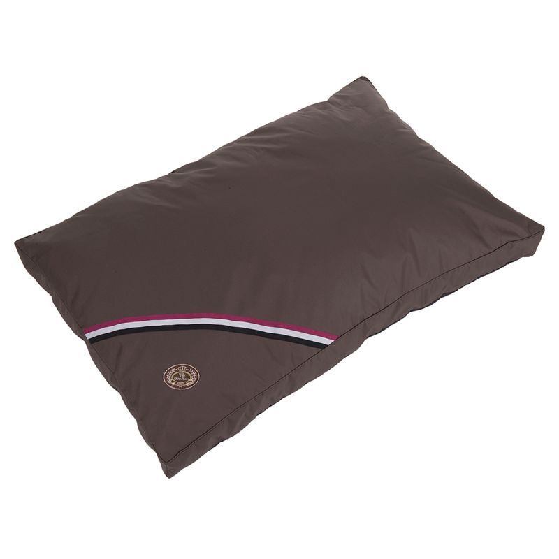 Brown rectangular cushion with decorative stripe in red, white and black and a round emblem at the bottom left.