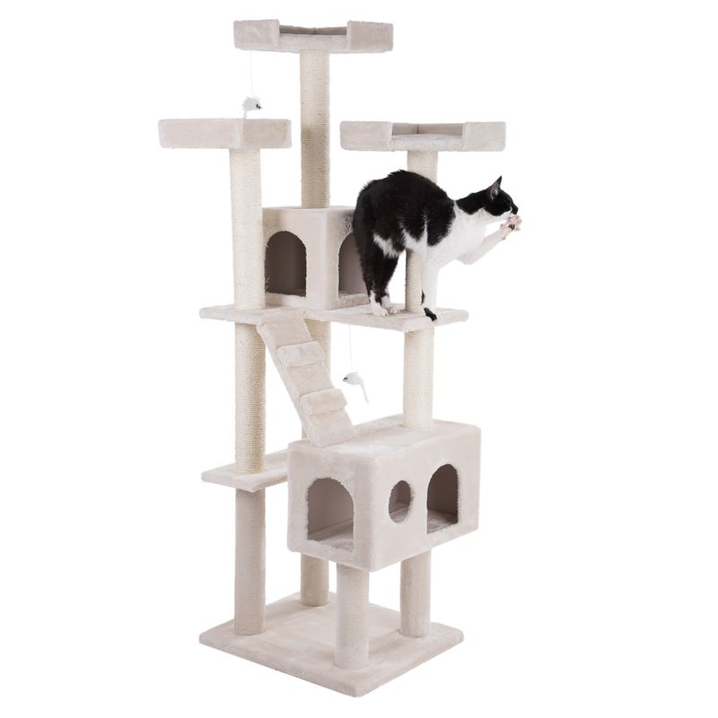 Beige scratching post with multiple levels, caves and toy mice. A black and white cat is playing on one of the platforms.