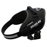 Black Julius-K9 IDC Power harness with reflective stripes and handle, suitable for dogs.