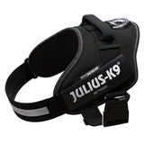Julius-K9 IDC Power dog harness in black with reflective stripes and sturdy metal ring for leash attachment.
