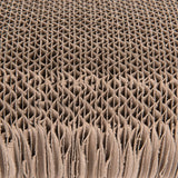 Close-up of corrugated cardboard with honeycomb structure, suitable for scratching surfaces or packaging material.