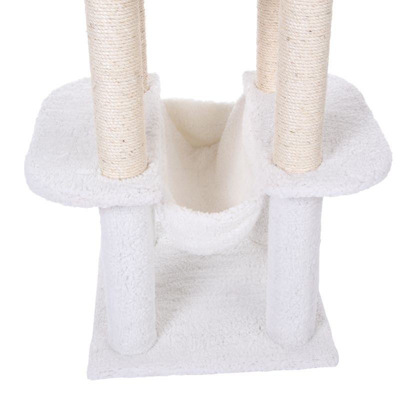 Cat tree with white plush cover, hammock and sisal-wrapped posts.