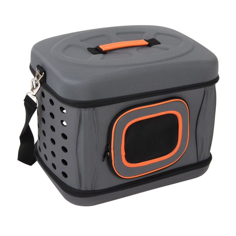 Grey transport box with orange handle, side ventilation holes and mesh window. Removable shoulder strap and visible zip.
