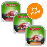 Rocco Menu wet food trays, visible varieties: Beef with vegetables & rice, Beef, lamb, vegetables & rice, Beef, poultry, vegetables & rice. Orange badge reads: Try now!