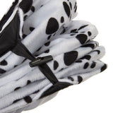 Folded dog blanket with Dalmatian pattern, white with black spots, and a black fastening strap.