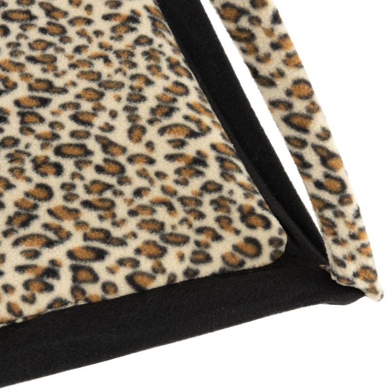 Close-up view of a fabric material with leopard pattern and black border.