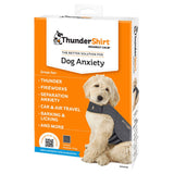 Dog anxiety solution packaging showing benefits for thunder, fireworks, separation anxiety, travel, barking and licking. Includes satisfaction guarantee and classic heather grey colour.