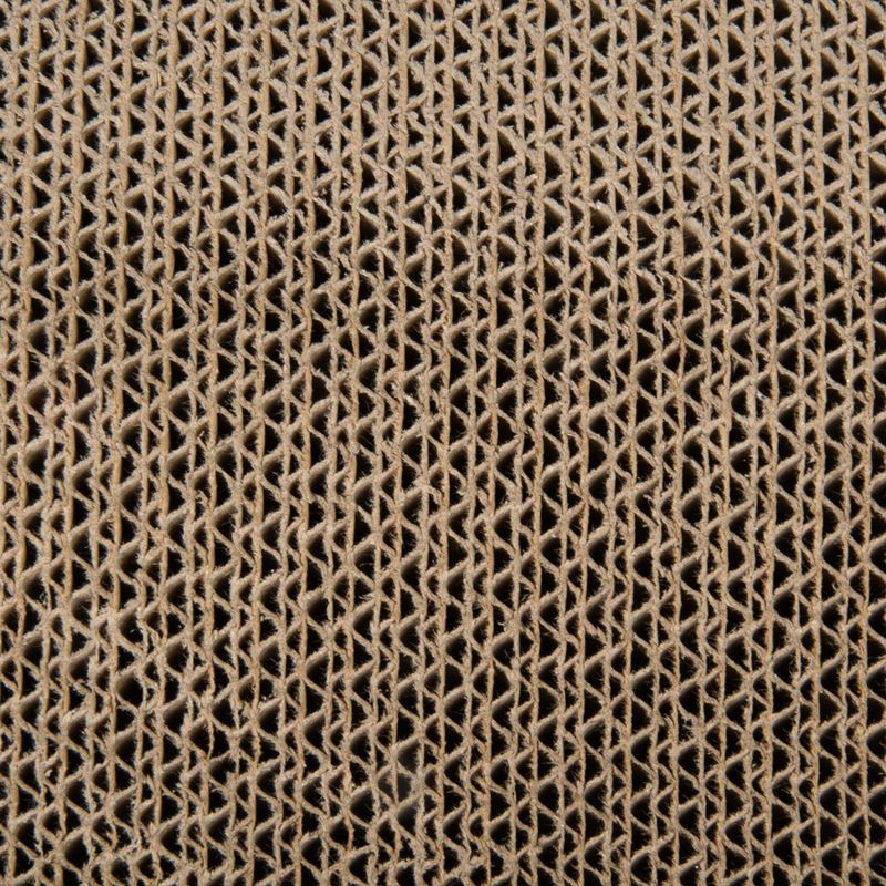 Close-up of corrugated cardboard with honeycomb structure, suitable for scratching surfaces or packaging material.