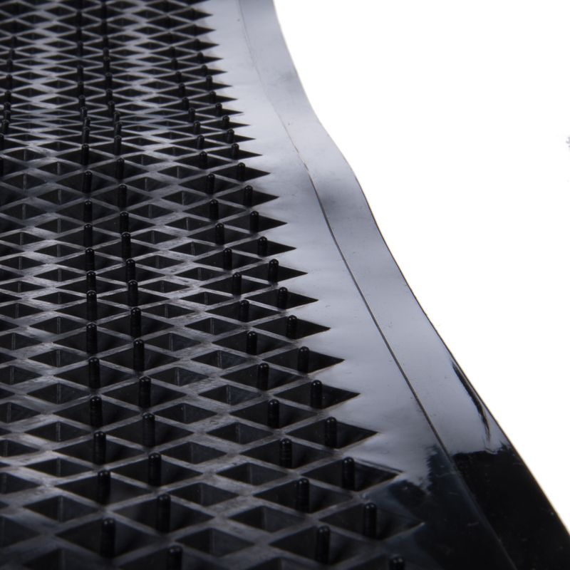 Black rubber mat with non-slip studs and geometric pattern, suitable for secure grip on smooth surfaces.