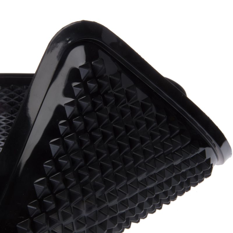 Black plastic surface with diamond-shaped texture, suitable for non-slip applications or accessories.