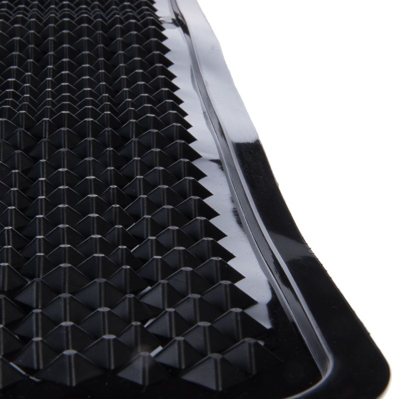 Black mat with non-slip, pyramid-shaped studs and raised edge. Suitable for secure grip and protection against dirt.