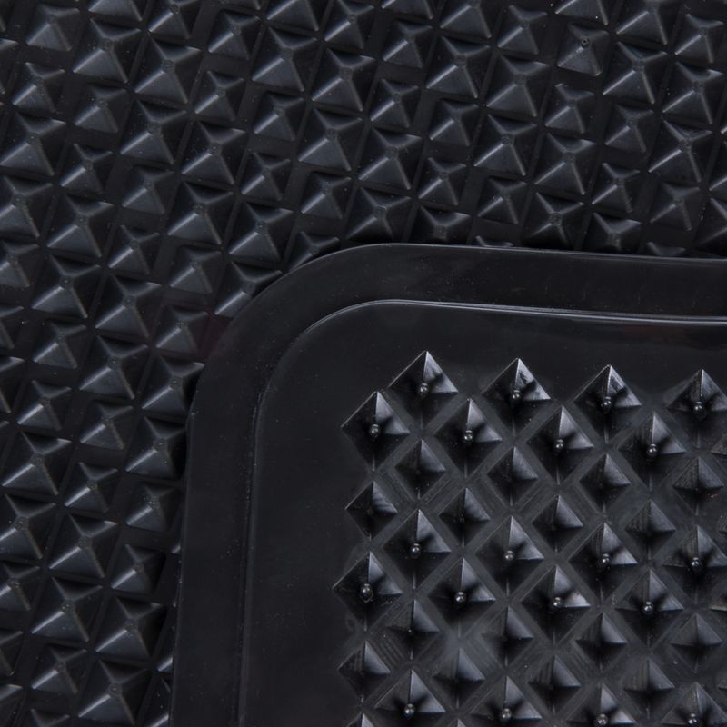 Black rubber mat with pyramid-shaped structure, suitable for non-slip surfaces.