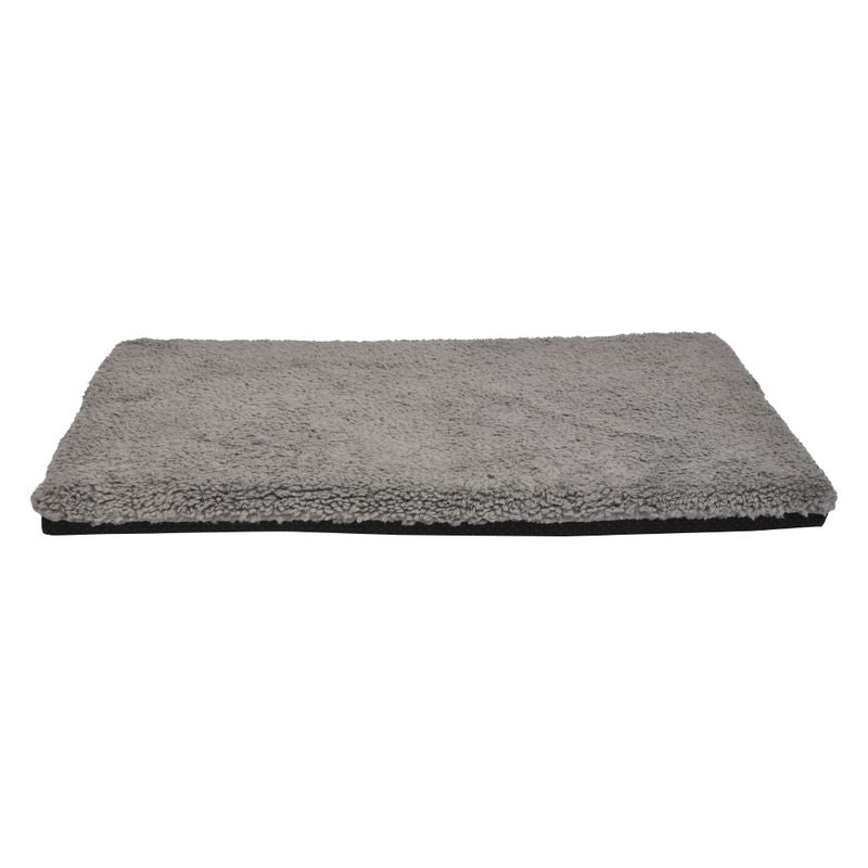 Grey rectangular mat with soft, fluffy surface and black underside.