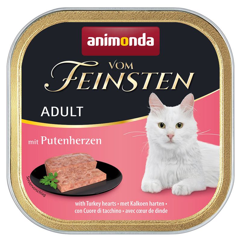 Animonda Vom Feinsten Adult with turkey hearts. Serving suggestion: pâté on black plate, white cat shown.