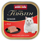 Animonda Vom Feinsten Senior with beef. Serving suggestion: meat piece on black plate, white cat shown.