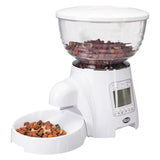 Automatic feeder by Trixie with digital display, transparent container for dry food and white food bowl.