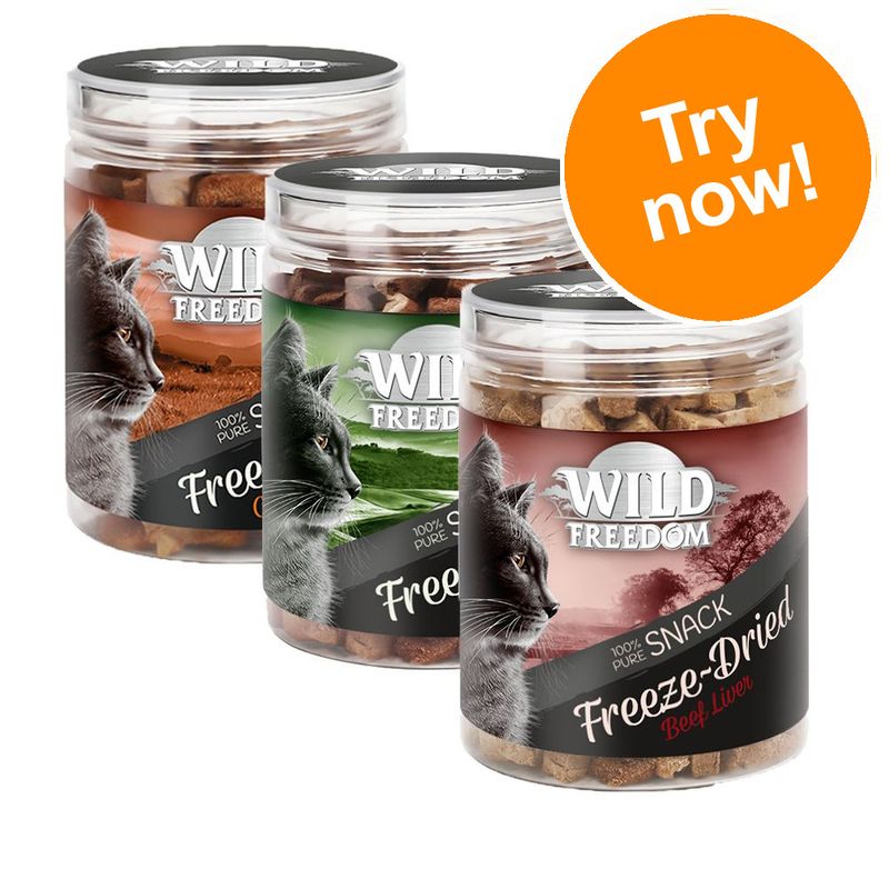 Three jars of Wild Freedom Freeze-Dried cat snacks, visible flavours include Beef Liver. Orange badge with white text: Try now!