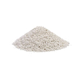 Pile of white, fine granulate pieces. Product image for litter or similar material.