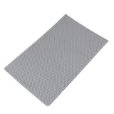 Grey mat with textured surface, rectangular shape.