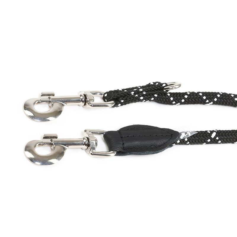 Close-up of two metal snap hooks attached to a black woven lead with white accents, showing connection points and material details.