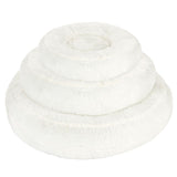 White, round plush bed with three tiered rings, suitable as a sleeping place or lounging surface.