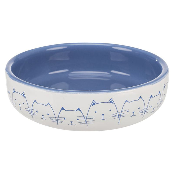 Ceramic bowl with blue interior and cat motifs on white exterior.
