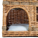 Braided basket with a white, soft cushion inside. Suitable as a sleeping place or retreat.