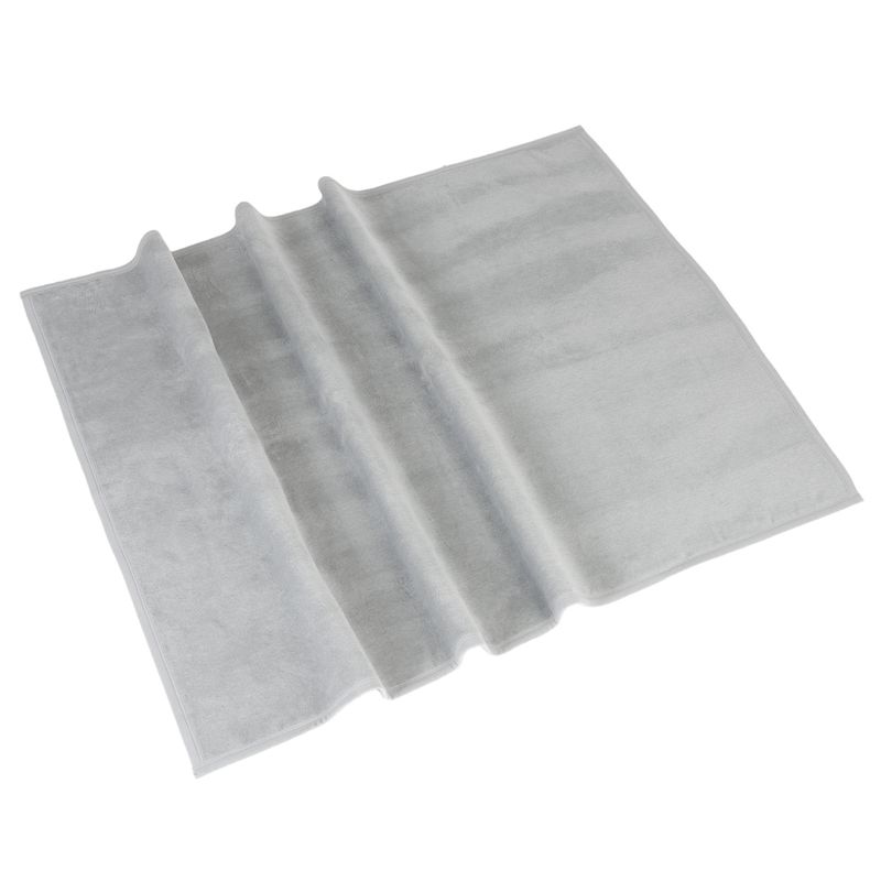 Grey mat with folded design, rectangular shape, suitable for various uses.