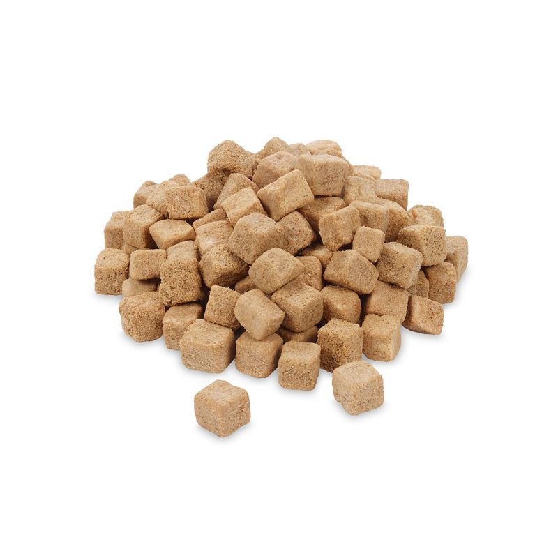 Pile of brown, cube-shaped dry food pieces.