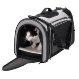 Transport bag with mesh windows and carrying strap, black-grey, open with a cat inside on a white cushion.