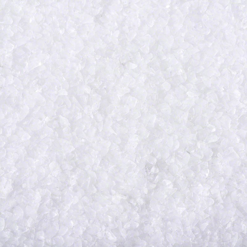 Close-up of white crystalline granules, showing product texture and consistency.