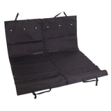 Black, foldable protective mat with fastening straps and zip, suitable for use in the car or on floors.