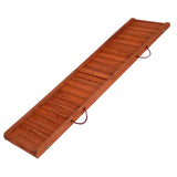 Wooden dog ramp with non-slip strips and carrying handles, foldable for easy transport.