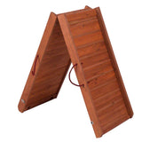 Wooden ramp with foldable design and red carrying handles, suitable for pets or other uses.