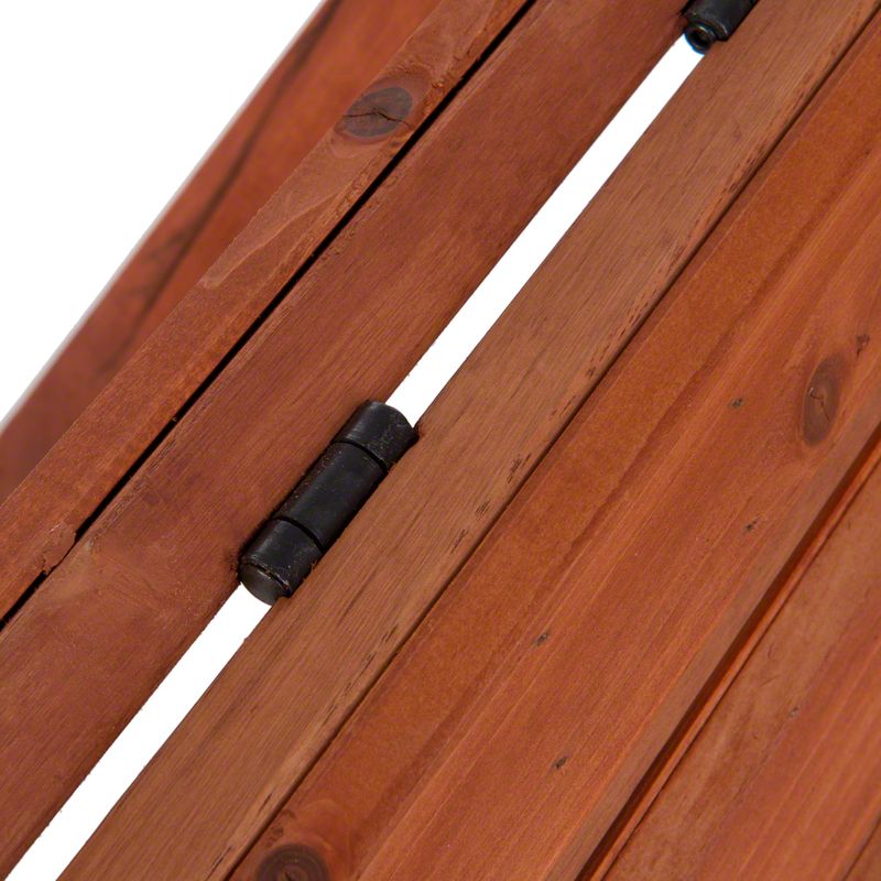 Close-up of a black hinge on a wooden surface, showing the connection and stability of the material.