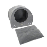 Grey pet house with round entrance and removable, soft cushion. Decorative dots visible on the front.