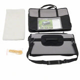 Pet Carrier transport bag with grey fabric, black mesh window, carrying straps, white insert and fastening pins. Product description visible on packaging.